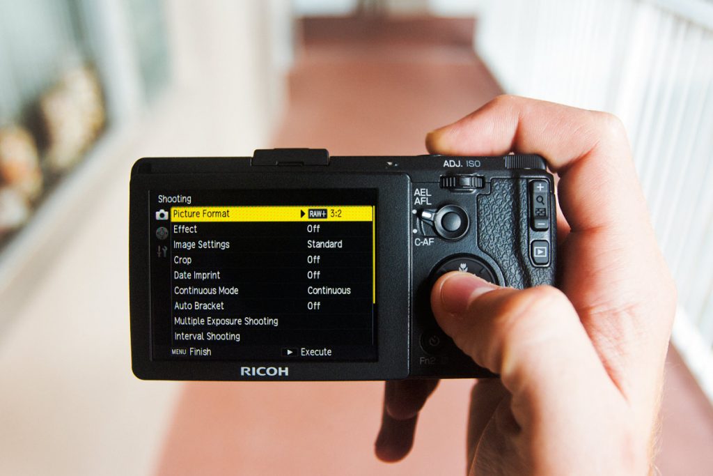 photo showing the shooting options of Ricoh GR Digital II 16.2 MP Compact Digital Camera - 1080p - Black